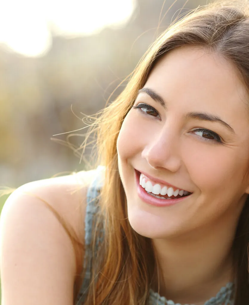 Young woman with dark blonde hair
